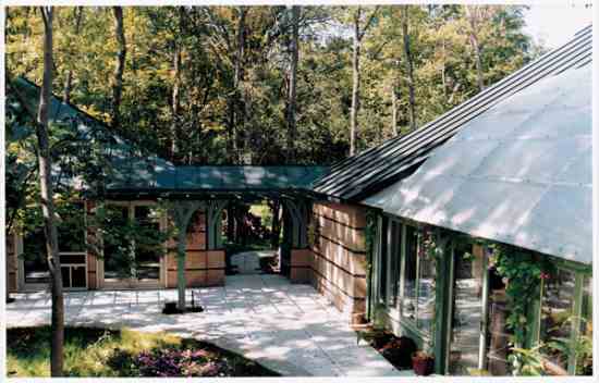 Vermont architect Ted Montgomery saved a majority of the magnificent trees in the Ten Stones Intentional Community by carefully siting the building.